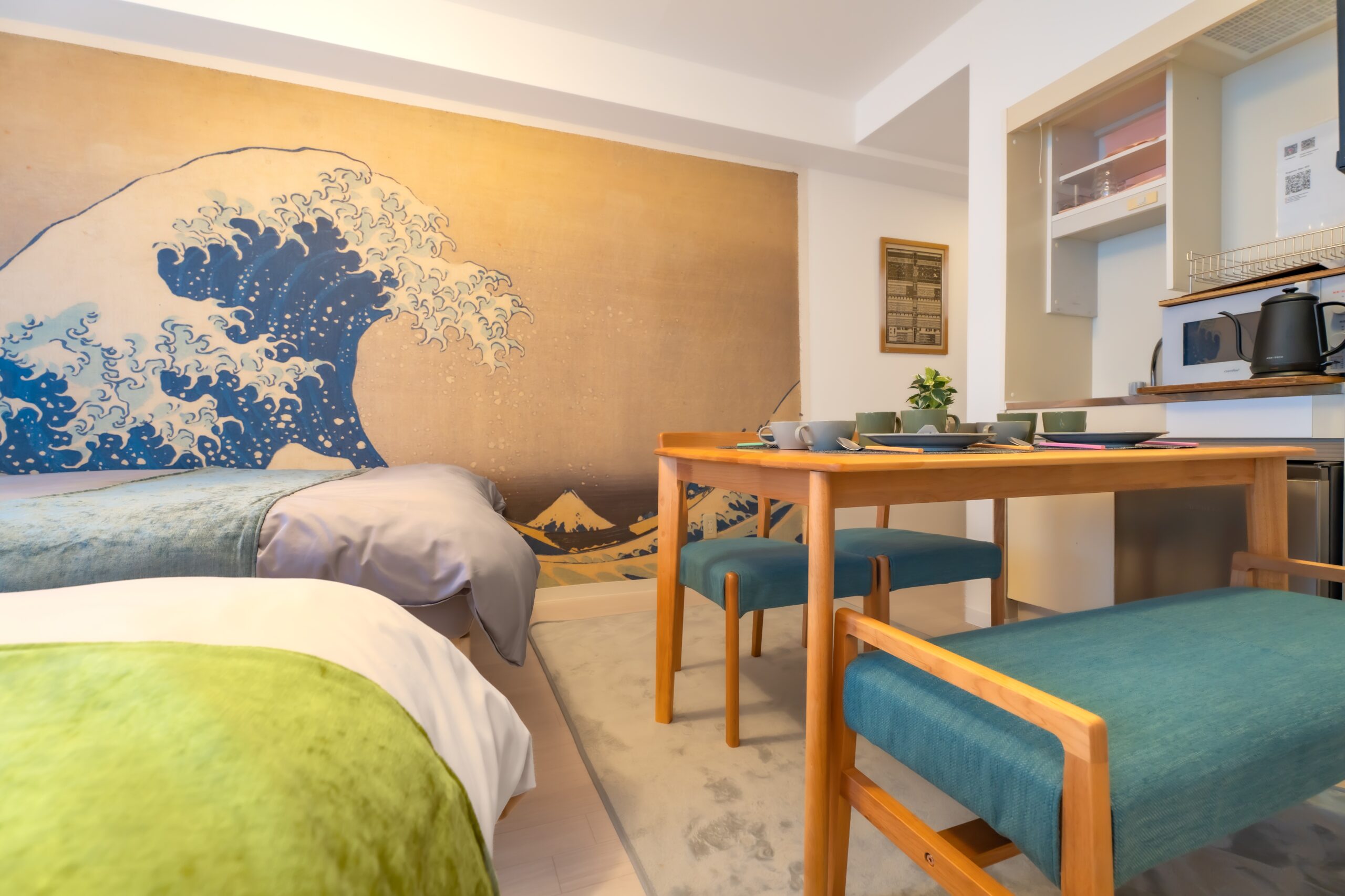 Great Wave mural close-up and kitchen